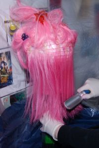 brushing in wig dye